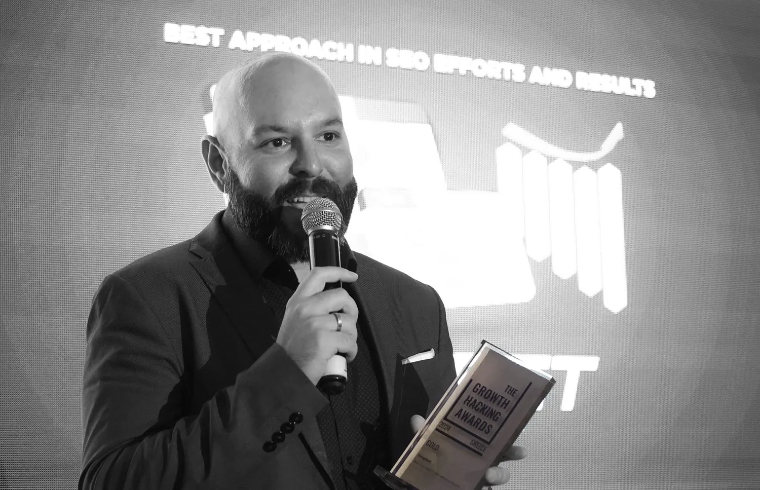 Emilio Takas accepting a Gold Growth Hacking Award