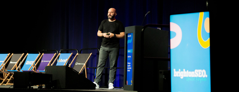 Emilio Takas on stage at BrightonSEO